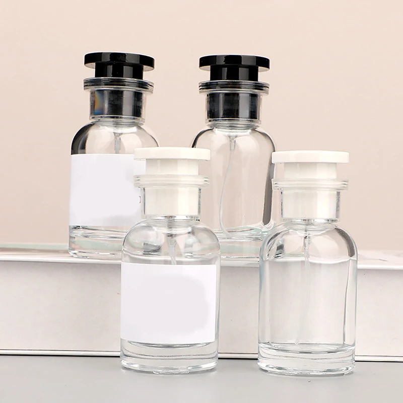 Nouvel Atomiseur de Parfum Portable 30ml – Flacons Échantillons en Verre Vides Rechargeables – Bouteille de Parfum Cylindrique de Voyage