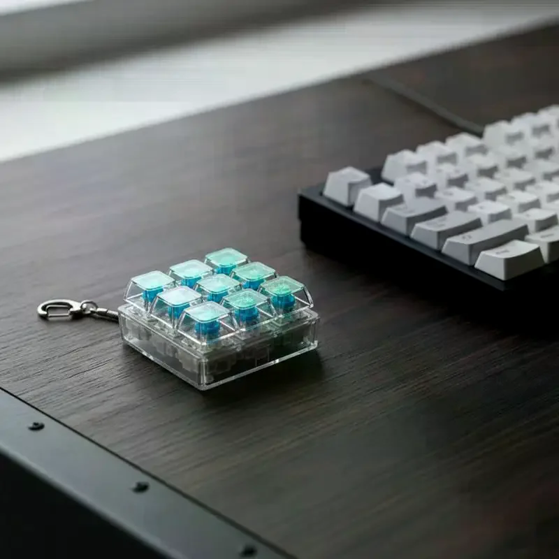 Mini Mechanical Keyboard Fidget Toy, 4-Key Clicky Design, Stress Relief Gadget with Keychain Loop.