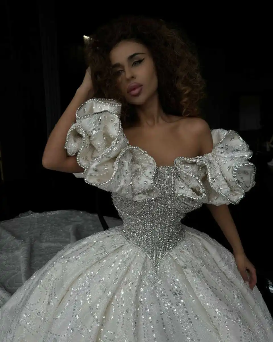 Gorgeous Ball Gown Wedding Dresses Off Shoulder Sleeveless Bridal Gown Sequins Crystal Ruffles Sweep Train Customized Dress