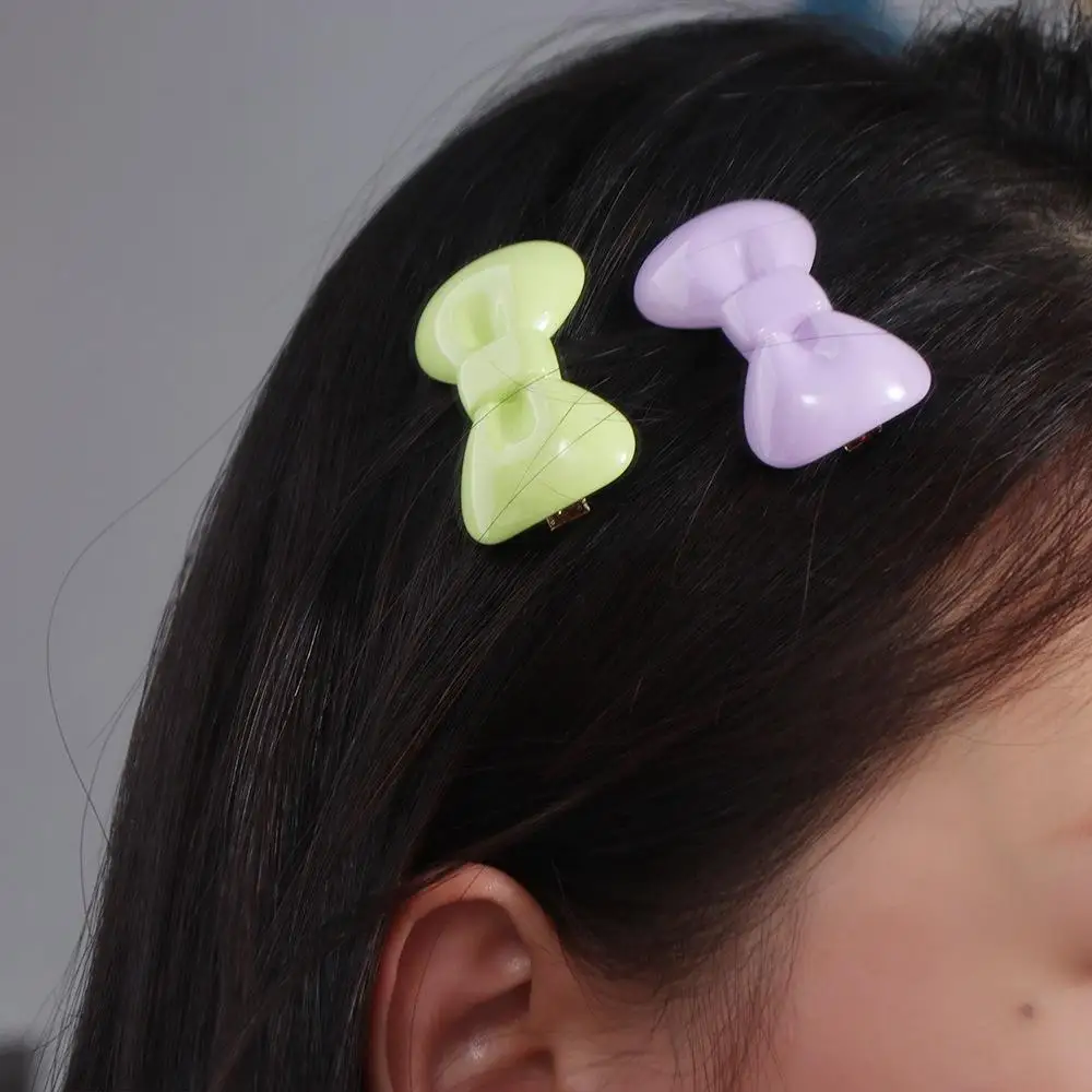 Рисунок 5 - Милая заколка для волос с бантом ярких цветов