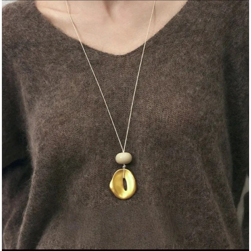 

Sweater chain high-end light luxury pendant necklace women's niche design temperament long simple fashion commuter necklace