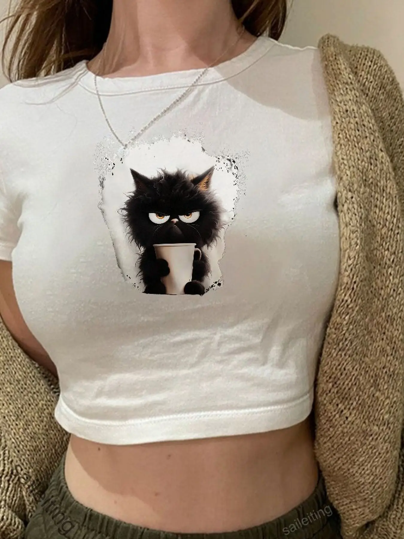 Funny Grumpy Black Cat Holding Cup Crop Top - Short Sleeve Graphic Tee, Beige Chunky Knit Cardigan, Olive Sweatpants, Summer