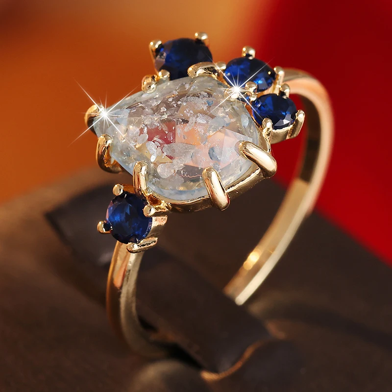Ästhetischer Damenring mit eingelegtem meerblauen Stein, trendige geometrische Form in goldener Farbe, für den täglichen Gebrauch, Partyschmuck, Jubiläumsgeschenk – Detail 2