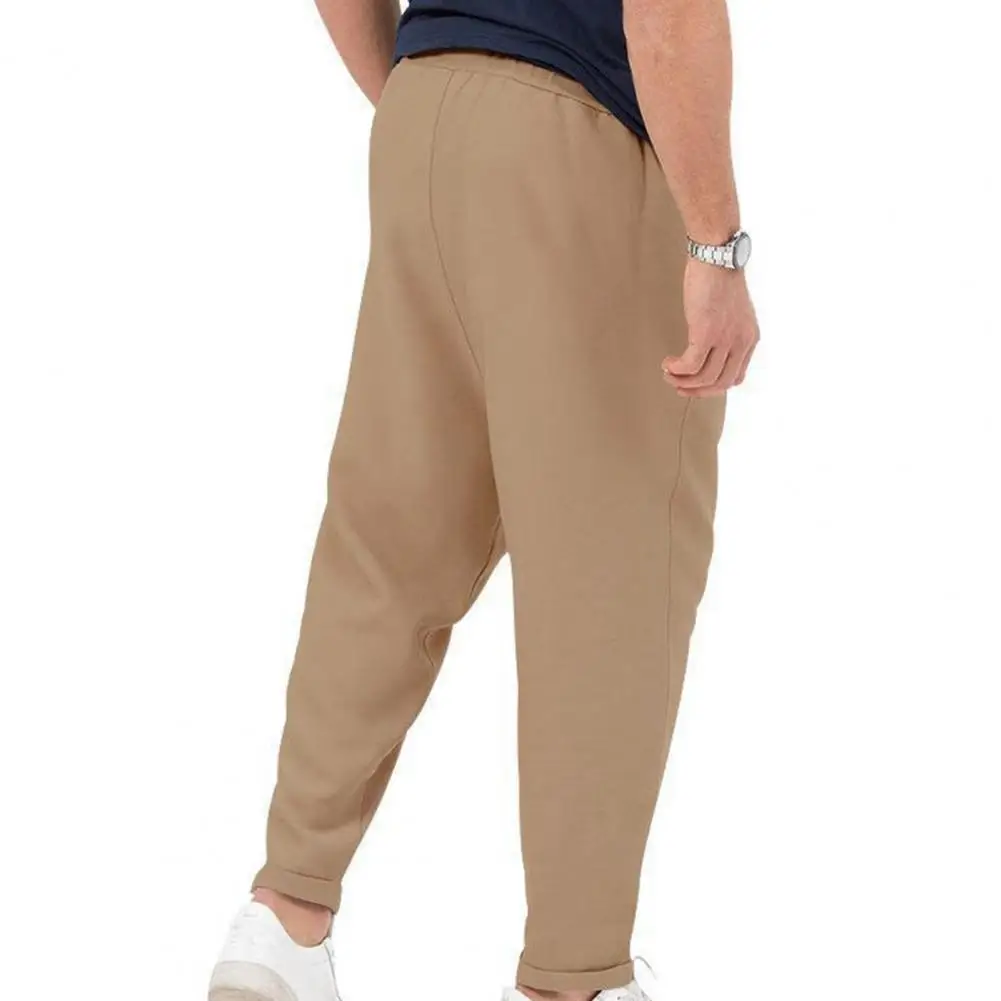 Pantalones holgados de cintura ajustable para hombre, pantalones de Color sólido, pantalones Harem de ajuste suelto con cinturón elástico, bolsillos para A