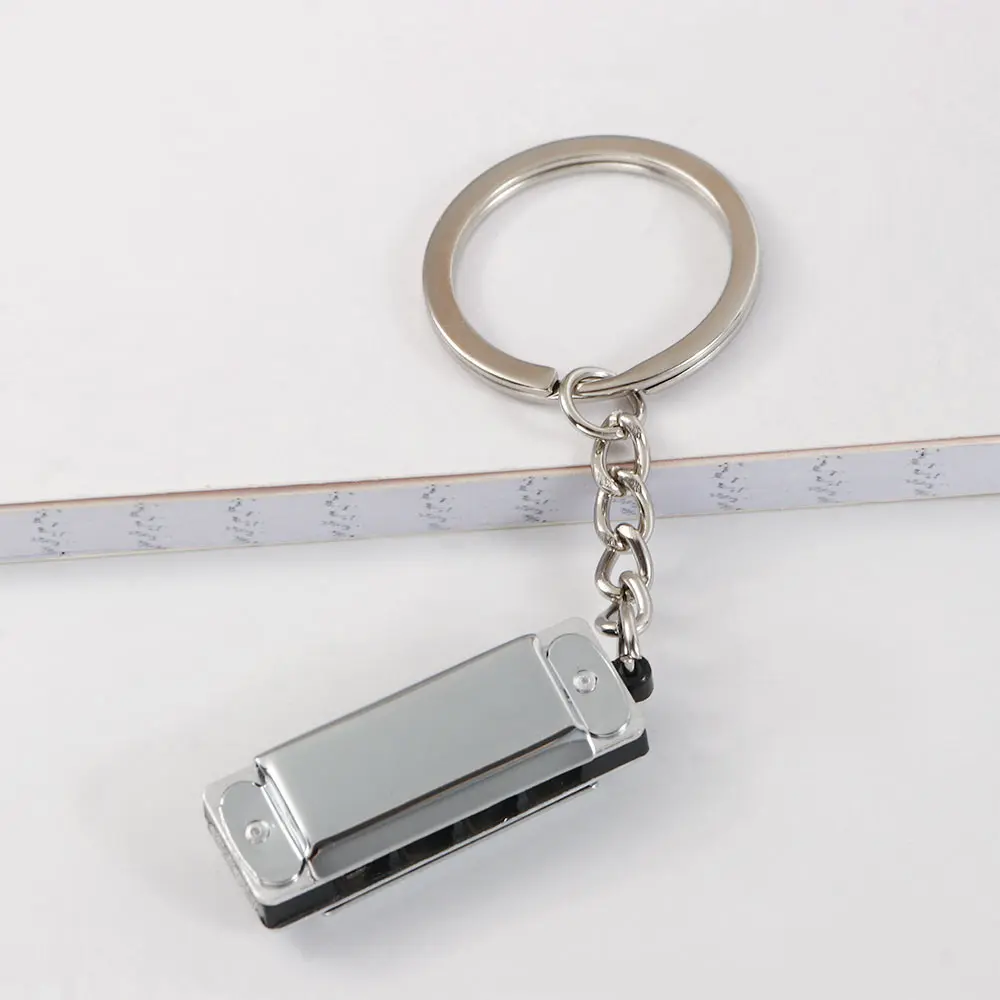 Cadeaux pour enfants Instruments de musique en forme d'instruments à vent pédales suspendues porte-clés porte-clés Harmonica porte-clés harmonique