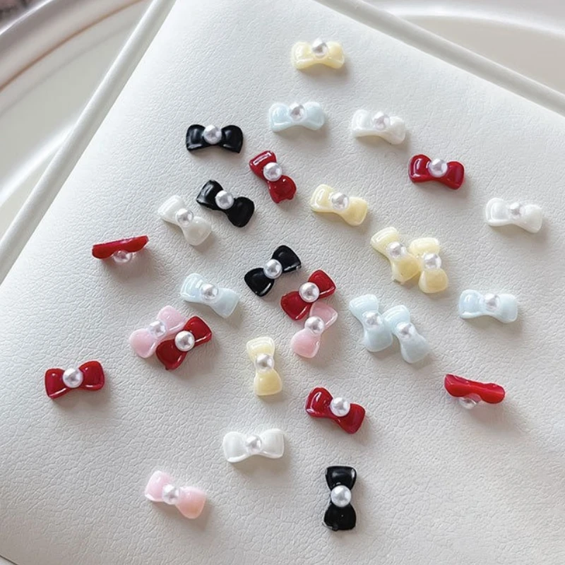 رائعة الفرنسية أنيقة Bowknot اللؤلؤ ربطة القوس فيونكة لطيف الراتنج الشريط سحر الحلو مسمار الفن زينة مانيكير اكسسوارات بالجملة