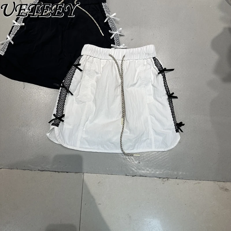 صيف جديد متعدد الاستخدامات الرباط مرونة عالية الخصر حافة الشريط تصميم تنورة قصيرة القوس المضادة للضوء بطانة ألف كلمة التنانير الصغيرة