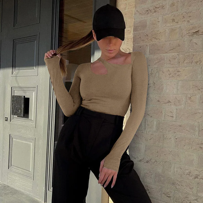 

Summer 2025 new asymmetric hollow neckline solid color jumpsuit American sexy hot girl fashionable casual slim long-sleeved top