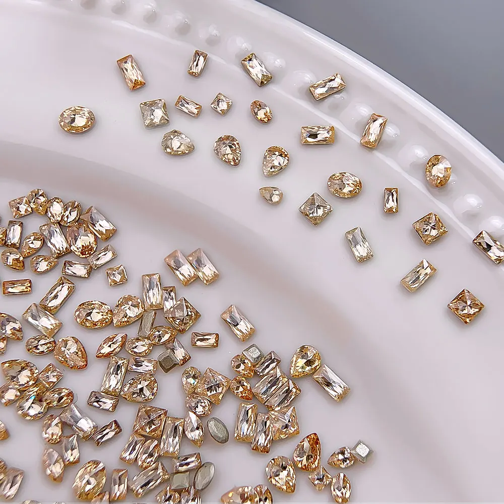 แชมเปญ Mini Flatback Zircon Rhinestones สําหรับเล็บ 5A ประกายชี้ด้านล่างแบนเล็บอัญมณีเจล Cat Eye Nail Art