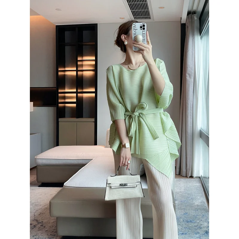 

Miyake fashion trend new pleated top irregular short sleeved loose mid length round neck T-shirt [91809]