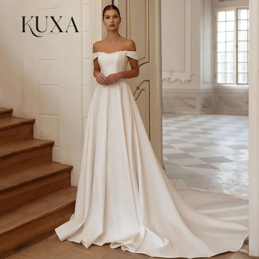 KUXA Wedding Dresses for Bride New Arrival Customized Off The Shoulder Pearls Applique Zipper Court Train Bridal Gowns 2026
