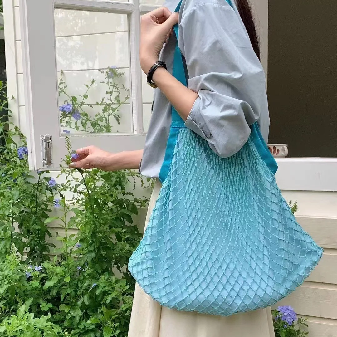 Bolso de malla informal para mujer, bolsa de mano de red de pesca, bolso de hombro tejido bohemio, bolso de mano femenino de Color caramelo, monederos de compras de frutas