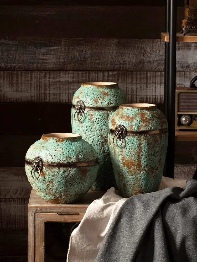 Modern simple handmade coarse pottery jars, vases, flower arrangements, dried flowers, old antique flower pots three-piece set