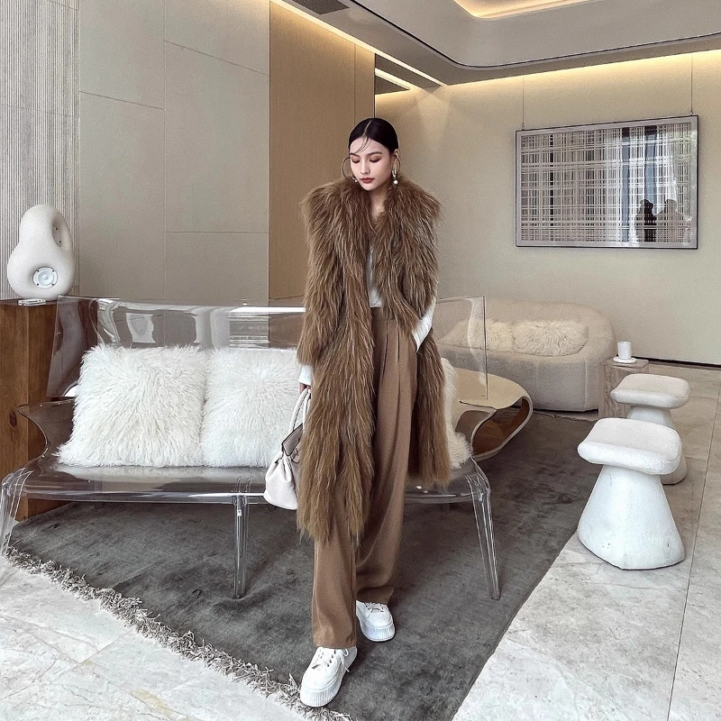 YOLANFAIRY الخريف والشتاء رشاقته الأبيض الراكون الفراء نسج مهدب وشاح بلا أكمام لون نقي شارع العليا سترات الفراء 2025
