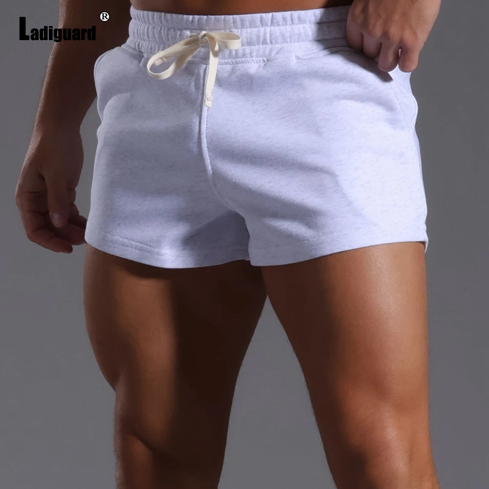 2025 New Summer Casual Running Shorts Men Sexy Elastic Wiast Ultra-shorts Male Stand Pockets Casual Beach Short Pants Gray White