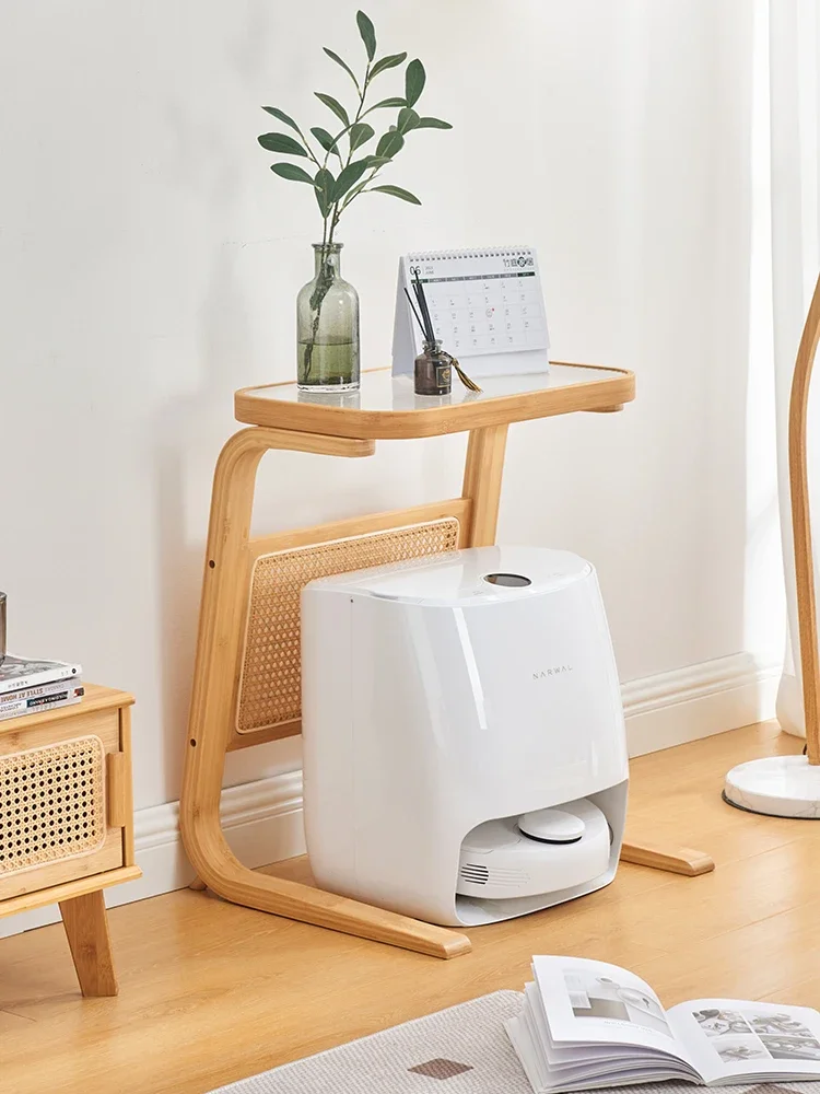 Sweeping robot storage rack, storage cabinet above Ecovacs, movable rattan edge next to sofa, living room