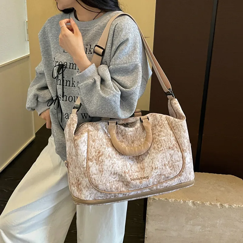Japanese and Korean style large-capacity travel bag for women, lightweight, expandable, can be carried by hand or worn crossbody