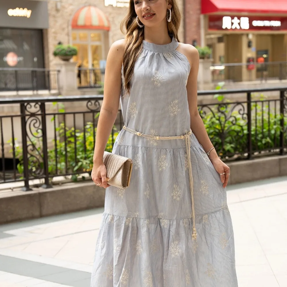 Abito francese elegante a righe floreali con ricamo all'americana Abito estivo longuette ampio senza maniche estivo da donna con cintura 2025