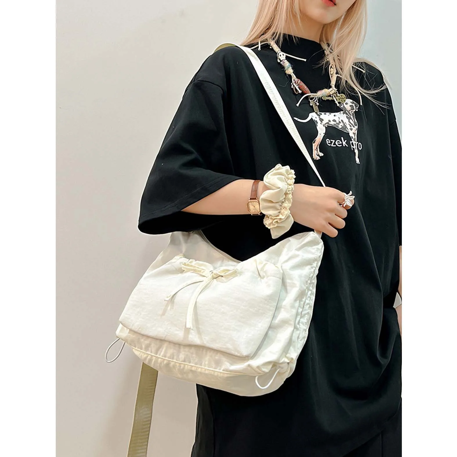 

2025 niche design pleated puff bag drawstring bow bag large capacity lightweight commuting shoulder crossbody bag