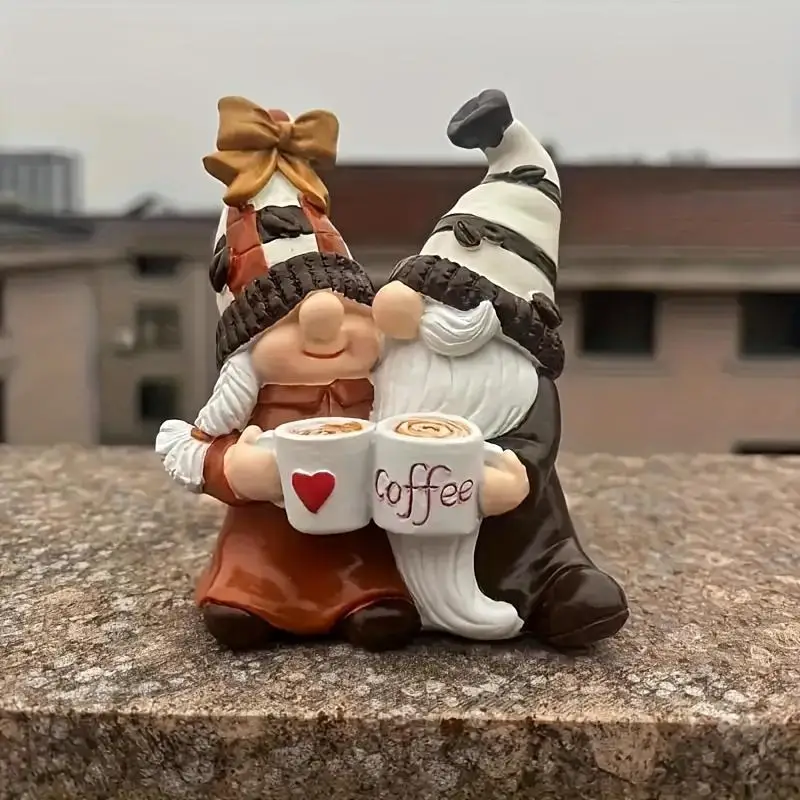 A romantic dwarf coffee couple embracing a statue, handmade and full of love, suitable for indoor home and kitchen placement