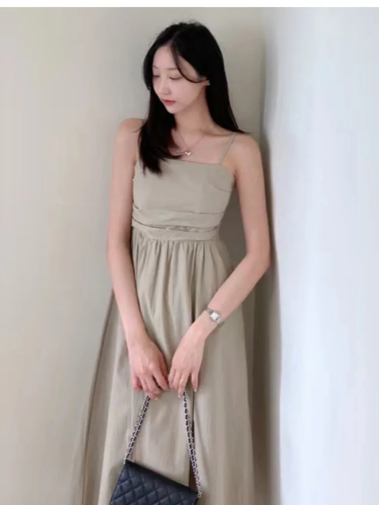 تنورة طويلة صيفية أنيقة بخصر مرتفع وتصميم ملفوف بدون أكمام، مناسبة للعمل، بأسلوب حلو من ألياف البوليستر