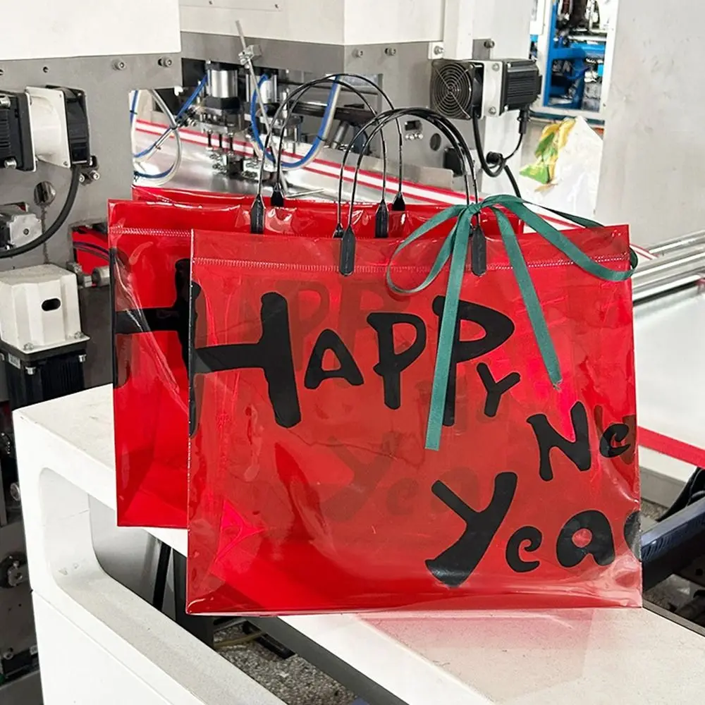 Bolsa de embalaje de regalo roja de Año Nuevo, bolsa de compras transparente con letras festivas, bolsa de mano ecológica para hombres