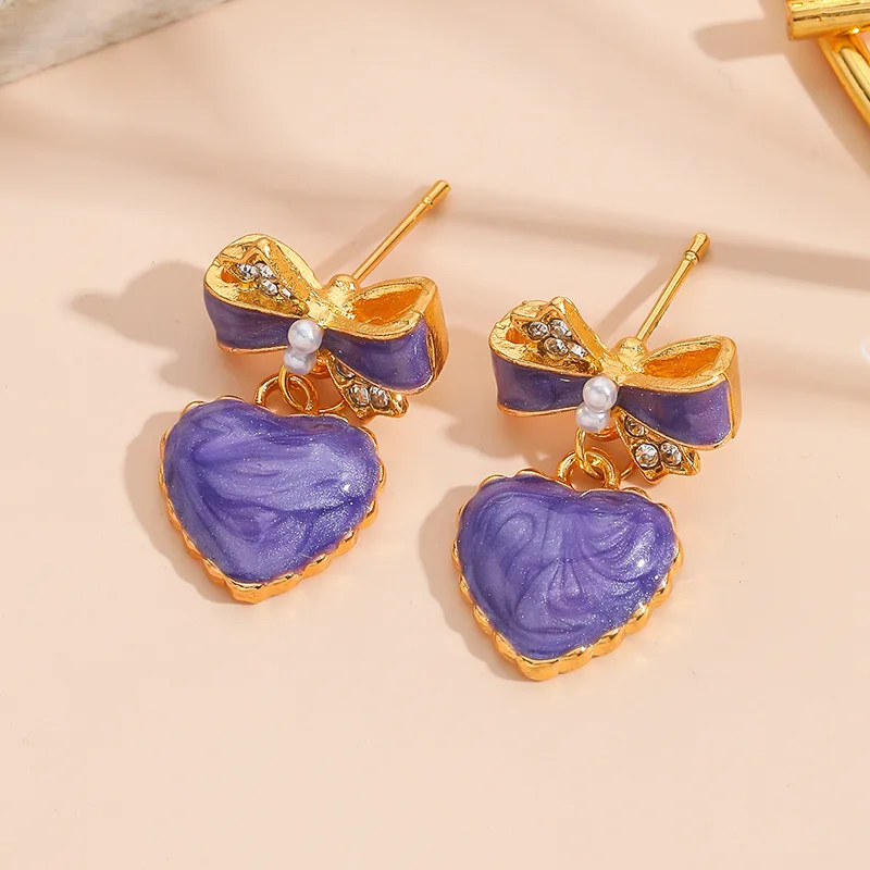 

Exquisite Purple Bow Peach Heart Earrings For Women Temperament Cute Heart-Shaped Earrings Summer Vacation Style Jewelry Gift