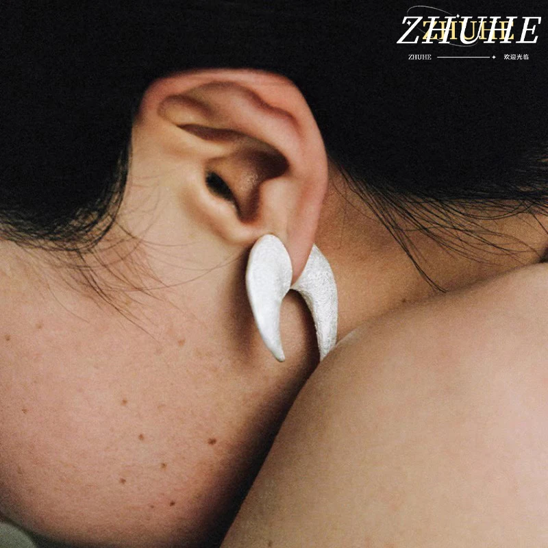 

The Retro Textured Moon Rock Earrings Feature A Matte Finish And A Niche Design That Is Fashionable And Neutral