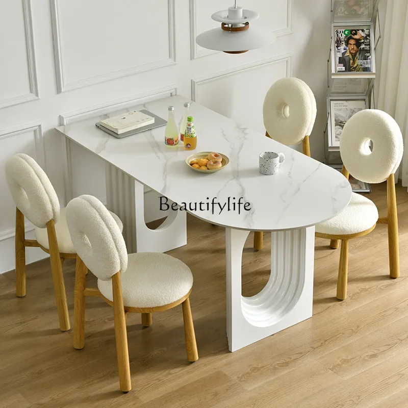 

French cream wind rock slab island table integrated oval household small apartment