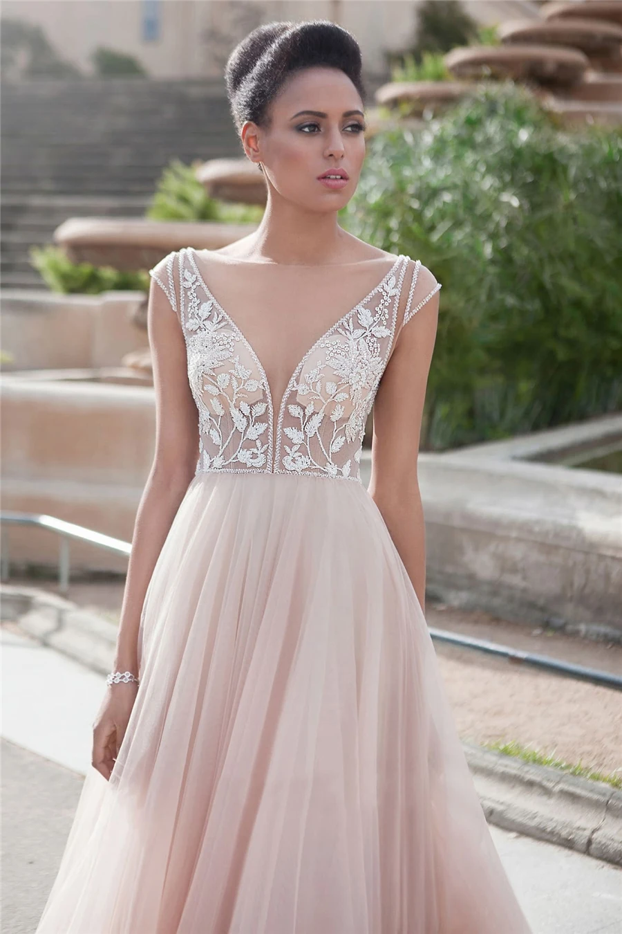 Customized upper body semi transparent wedding dress, decorated with lace and chiffon, sexy and fashionable wedding dress