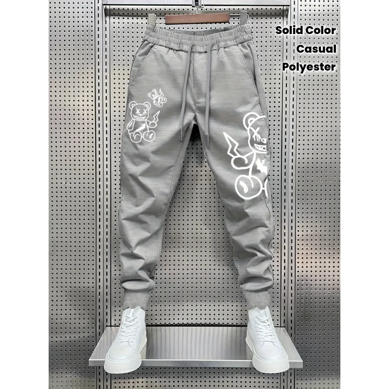 

Fashionable Printed Casual Running Pants，Mid-Length，All-Season Wear，Knitted Structure，Fashionable Street Style Men'S Pants。