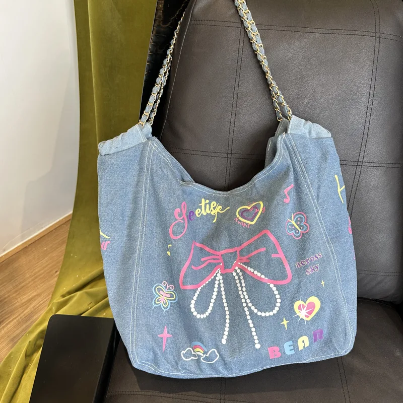 

Sweet Bow Printed Handbag Women New Chain Drawstring Shopping Shoulder Bag 2025 Summer Large Capacity Fashion Denim Beach Bag