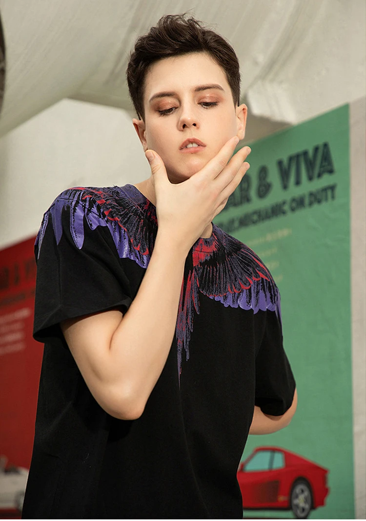 

Marcelo Streetwear MB Purple Feathers Wings ort Sve T-irt ex Couple Faion Cotton round Ne Summer Loose Fit T-S...