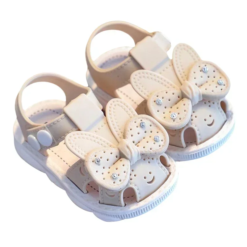 Scarpe estive per bambini con fiocco solido Sandali antiscivolo da spiaggia in PVC carino per neonate Calzature Sandali morbidi per bambini alla moda