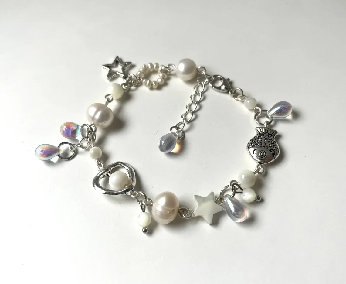 wave to earth bracelet | flaws and all | handmade beaded bracelet | white jewelry | w2e merch