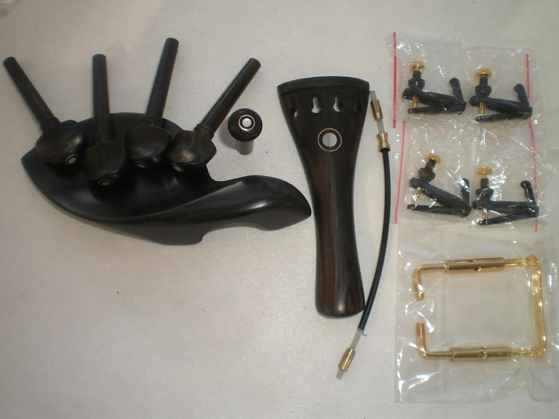 1 Set Ebony Natural Color Violin Parts with Parision Eye 4/4 with 4 Fine Tuners 1PC Chin Rest Clamp 1 Gut