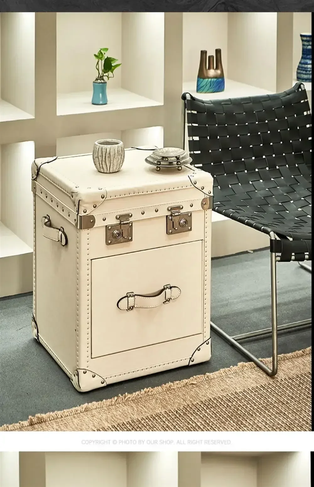 A bedside table, a few cabinets on the edge of the leather box, a few retro leather edges, living room storage, bedside table