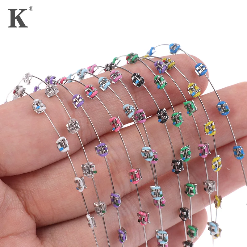 

2Pcs Split Type Colorful Brackets Fake Braces Without Hook Temporary Tooth Decoration Metal Bracket Dental Tool