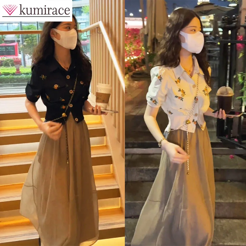 

2023 Women's Skirt Set Summer New Product Set Printed Short Sleeve Top+Medium Length Yarn Skirt Umbrella Skirt Two Piece