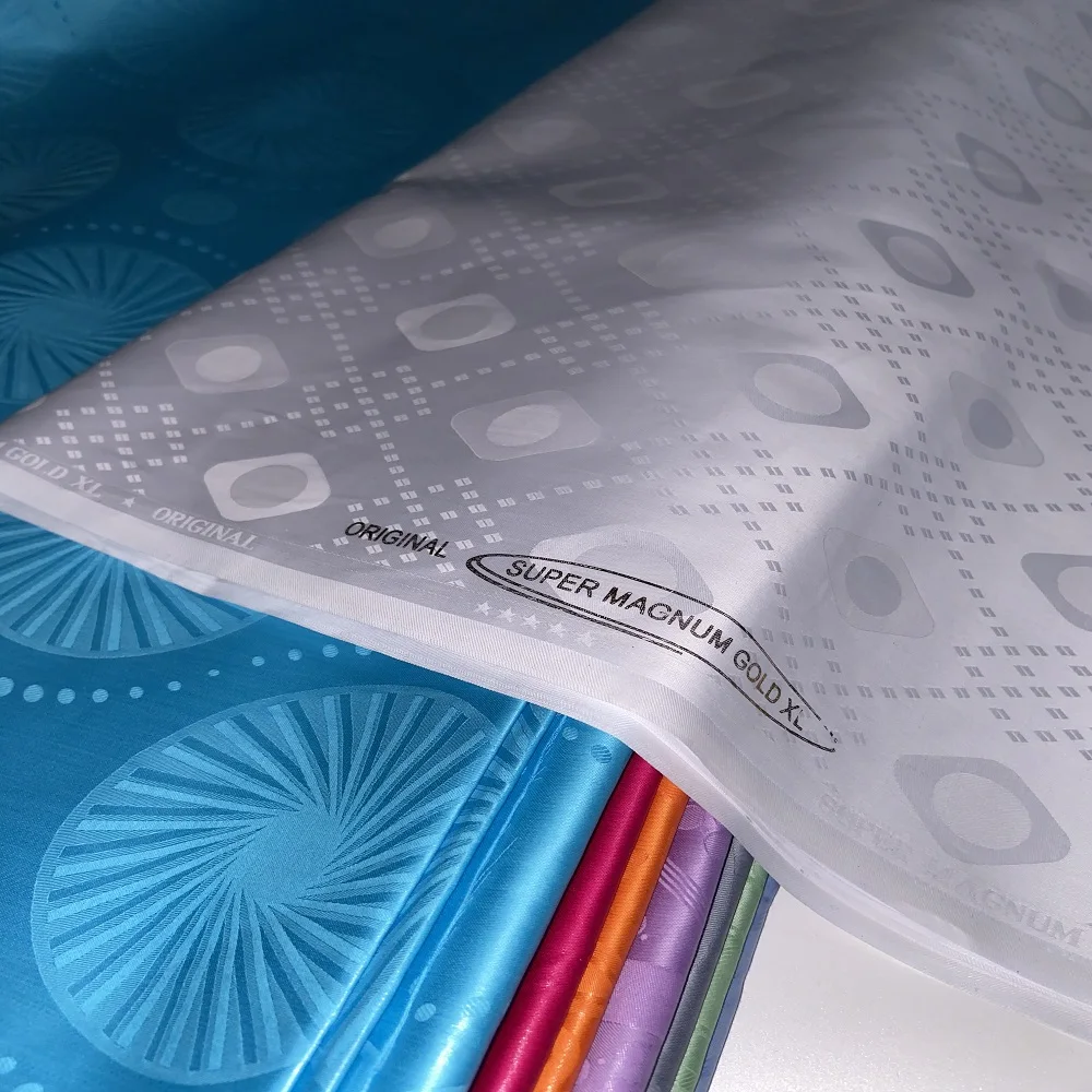 2025 تصميم جديد بازان الثراء النسيج النمسا جودة Feitex الجاكار غينيا الديباج النسيج 100% القطن Shadda