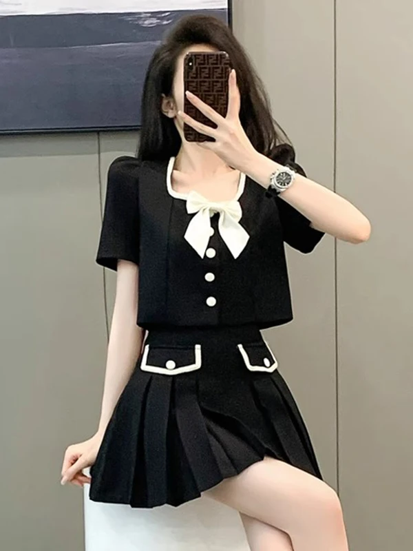 กระโปรงสีดําเอวสูงกระชับสัดส่วนชุดสตรี Ele ความรู้สึกขั้นสูงเส้นใยโพลีเอสเตอร์ยาว Sve รอบ Ne Top
