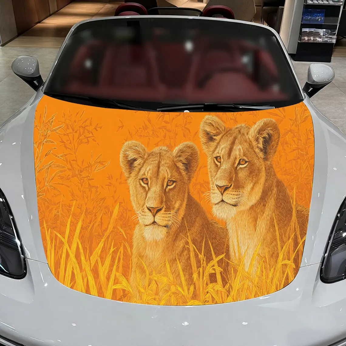 Car Decals A Lion Pair Design with Vibrant Orange Grassland Textured Background & Artistic, Dynamic Visual Details Car Hood Stic
