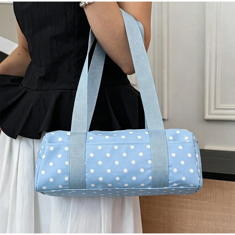Gepunktete Schultertasche in langem Zylinderformat, Damen-Handtasche mit Tragegriff, zylindrische, leichte, schicke Tragetasche für den Arbeitsweg – Detail 23