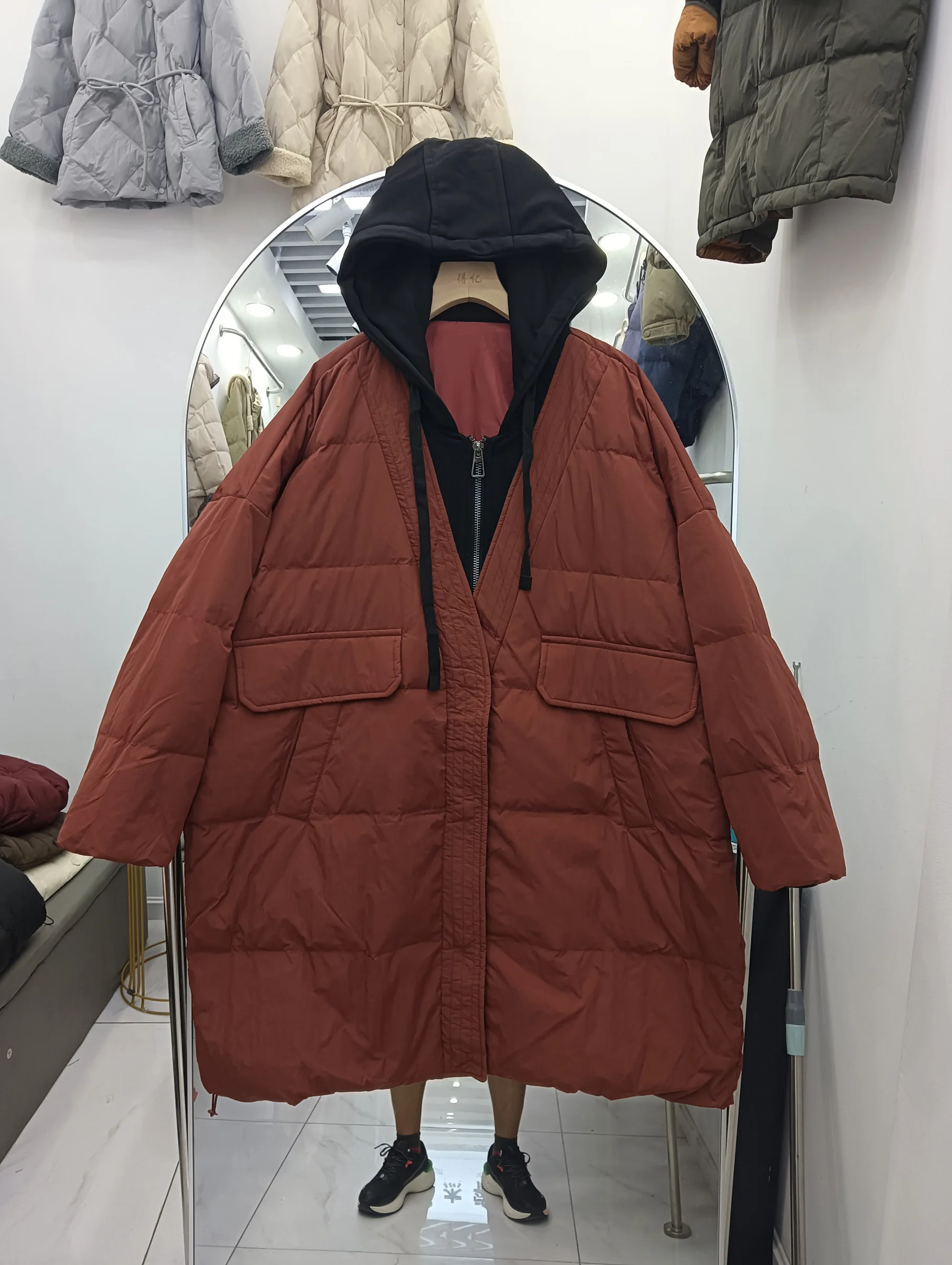 سترة نسائية جديدة موديل 2025 متوسطة الطول بقلنسوة كورية من Jaet ملابس خارجية حرارية من ريش الدفء باللون الأبيض