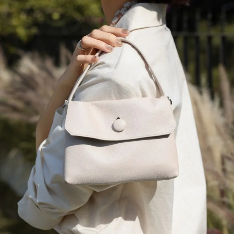 

Элитная женская сумка из натуральной кожи с кнопкой, коллекция Весна-Лето 2026, новая модель, из натуральной кожи, с верхней ручкой, для офиса