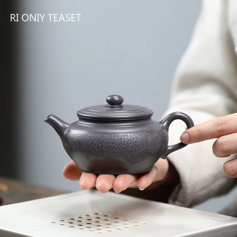 

170ml Chinese Yixing Purple Clay Teapot Kettle Handmade Fish Pattern Tea Pot Beauty Tea Infuser Household Zisha Tea Set Teaware