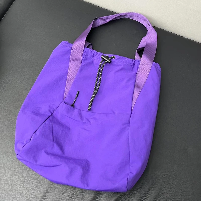 Sacos de pano de compras estilo formal para mulheres bolsas de designer de luxo e bolsas 2024 novo em poliéster grande capacidade mochila nas axilas bolsa de ombro alta qualidade Frete grátis Envio rápido chega