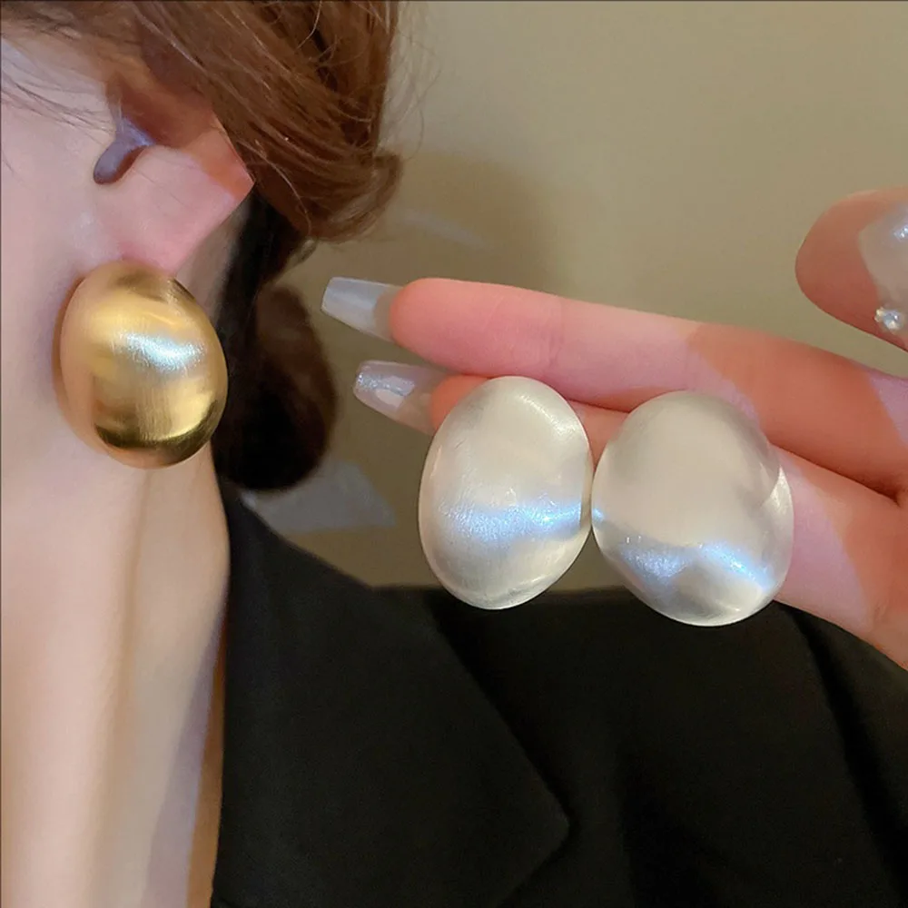 

Silvery Needle Brushed Geometric Oval Metal Earrings Cold Style Design Studs Fashionable And Exaggerated Jewelry