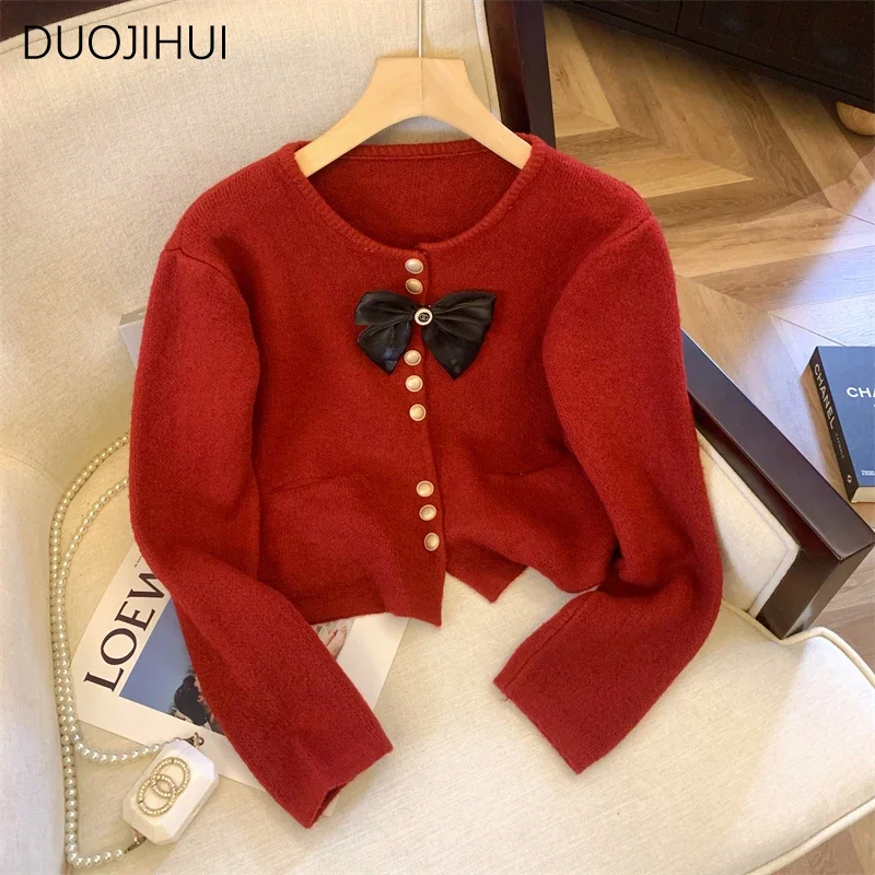 DUOJIHUI dolce Basic o-collo Chic Bow donna Cardigan autunno nuovo elegante semplice Casual tinta unita moda bottone Cardigan femminile