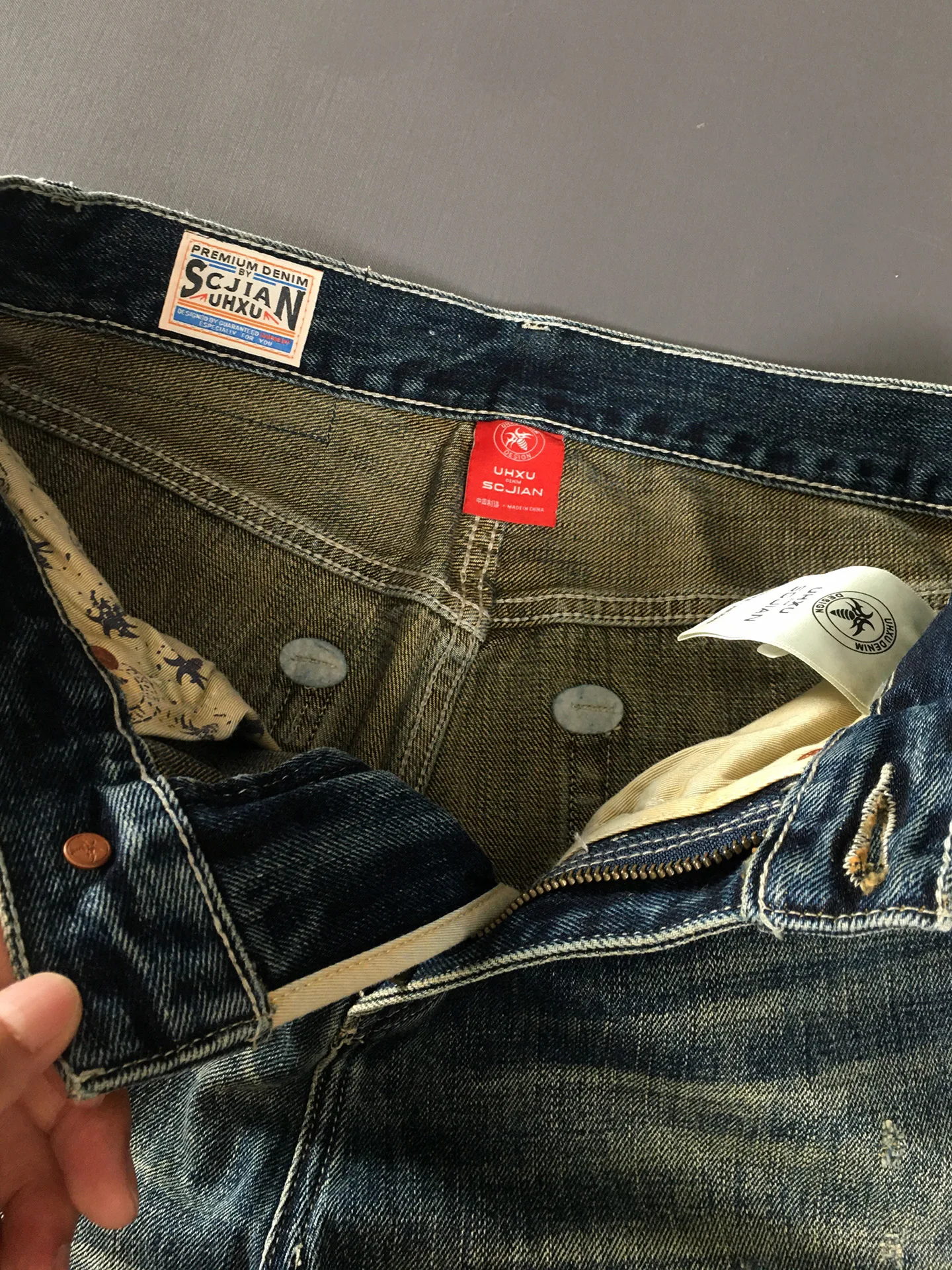 Pantalones vaqueros rasgados de alta calidad para hombre, pantalones holgados y rectos con parche Vintage americano, pantalones de calle desgastados lavados de algodón 100%